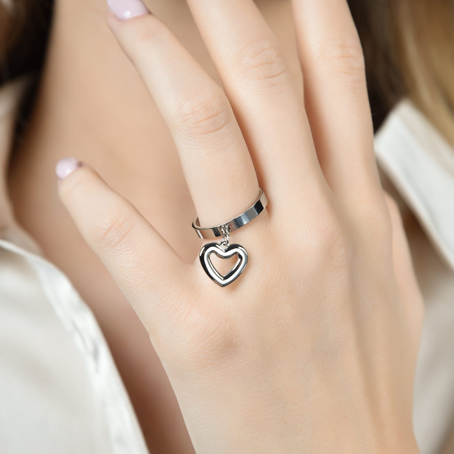 WOMAN STEEL RING WITH PIERCED HEART