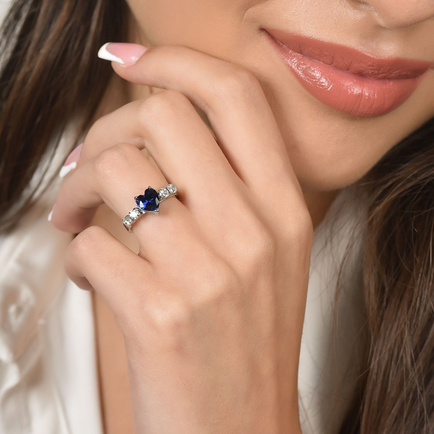 WOMEN'S STEEL RING WITH WHITE CRYSTALS AND BLUE CRYSTAL HEART