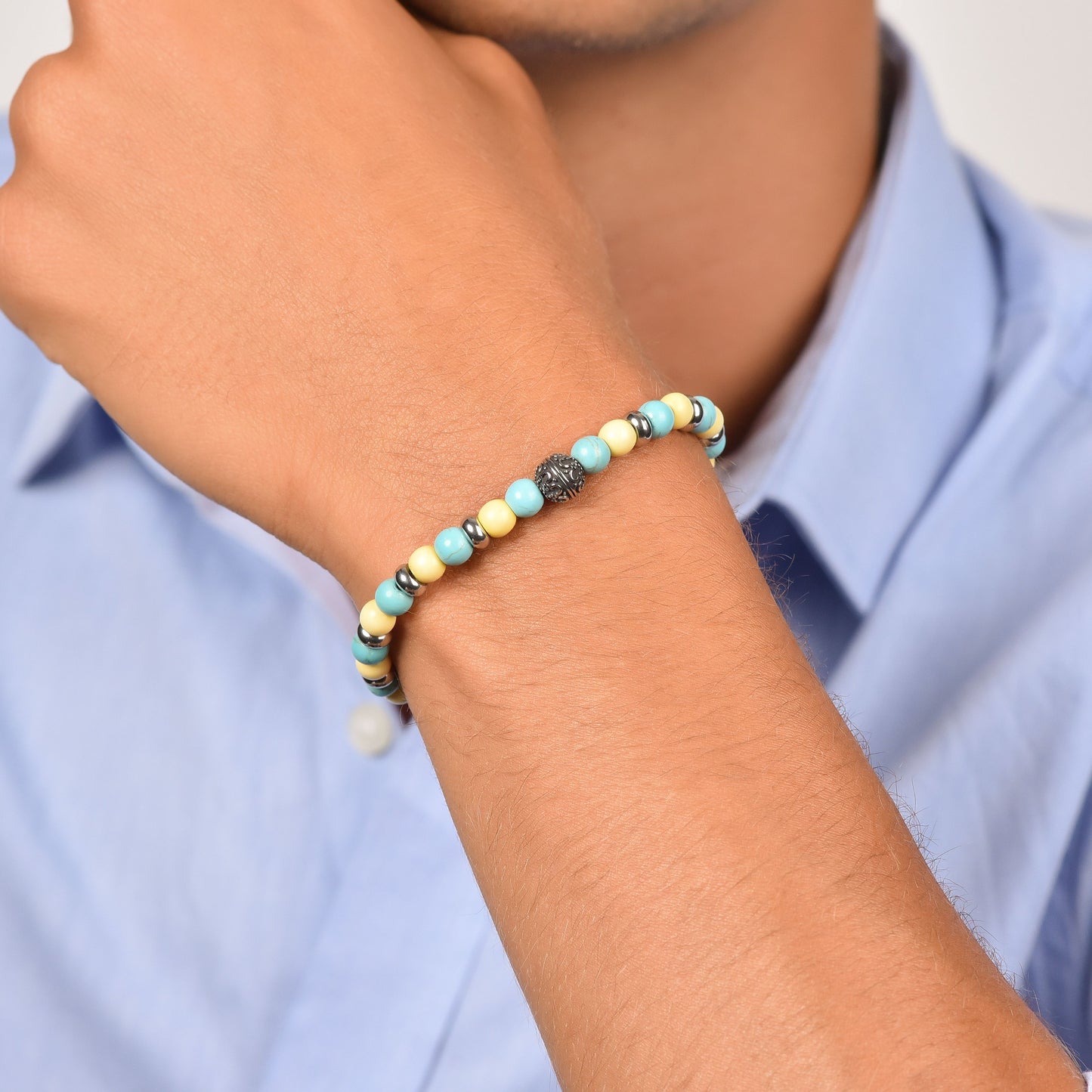 MEN'S ELASTIC BRACELET WITH TURQUOISE AND YELLOW STONES AND STEEL ELEMENTS