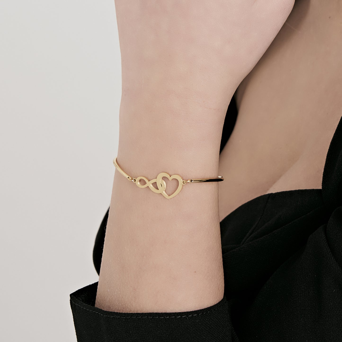 WOMEN'S IP GOLD STEEL BRACELET WITH HEART AND INFINITY