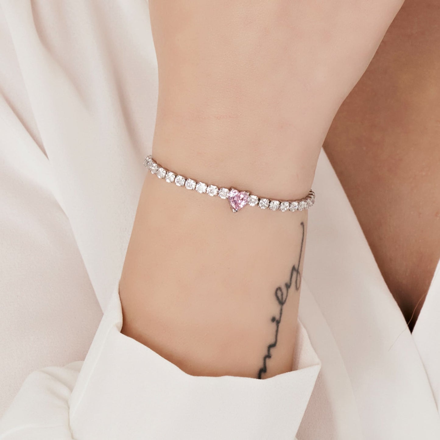 WOMEN'S STEEL BRACELET WITH WHITE CRYSTALS AND PINK CRYSTAL HEART