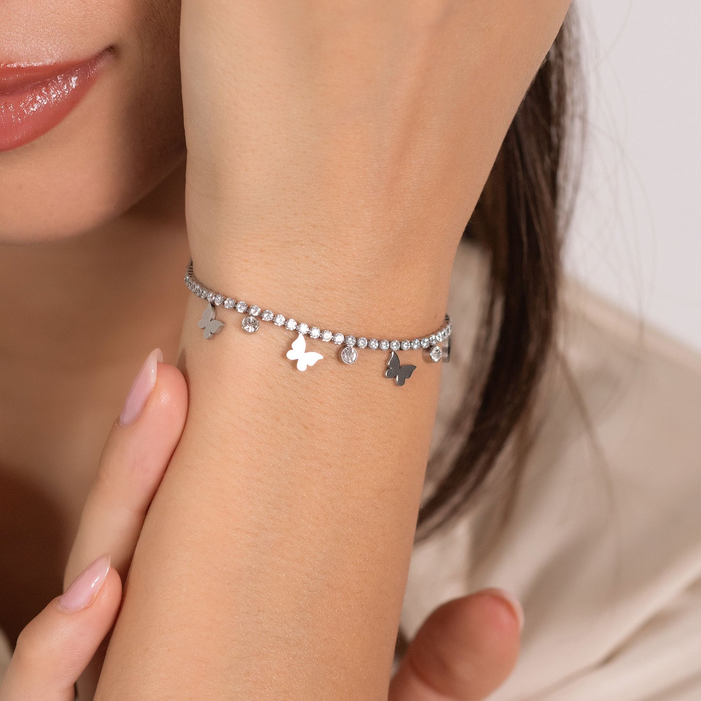 WOMEN'S STEEL TENNIS BRACELET WITH WHITE CRYSTALS AND BUTTERFLIES