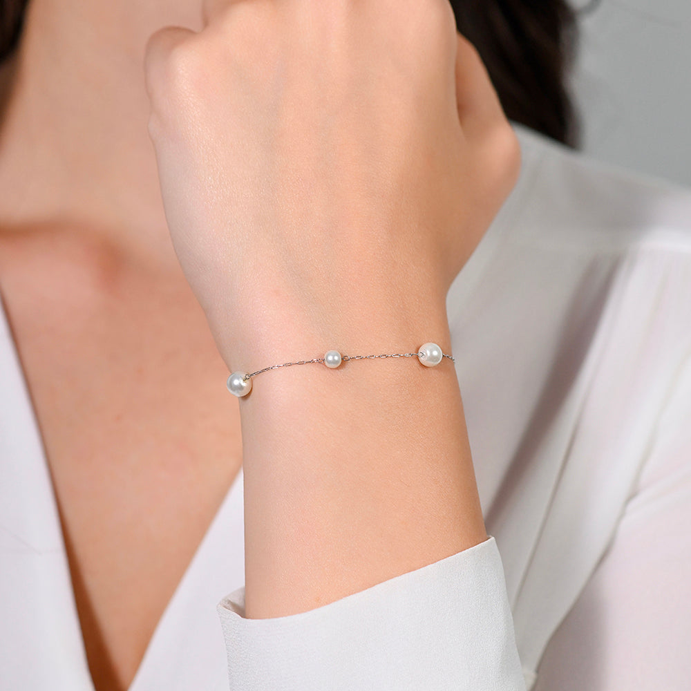 WOMEN'S STEEL BRACELET WITH PEARLS