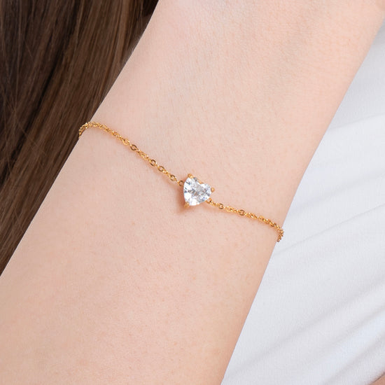 BRACCIALE DONNA IN ACCIAIO E  IP GOLD CON CUORE CRISTALLO BIANCO