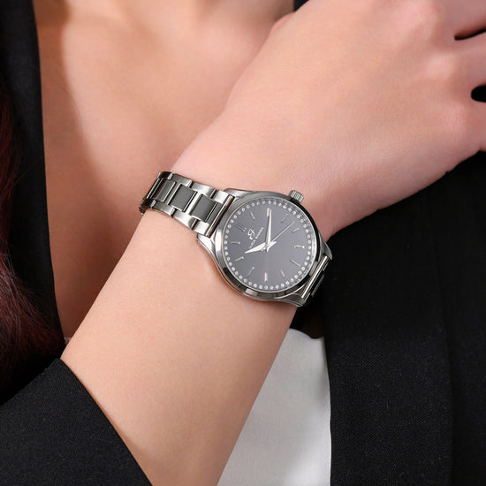 WOMEN'S STEEL WATCH BLACK BEZEL AND WHITE CRYSTALS