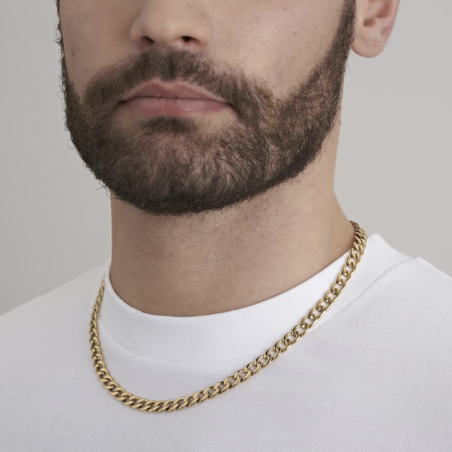 COLLANA UOMO IN ACCIAIO IP GOLD CON MAGLIA GROUMETTE 7 MM