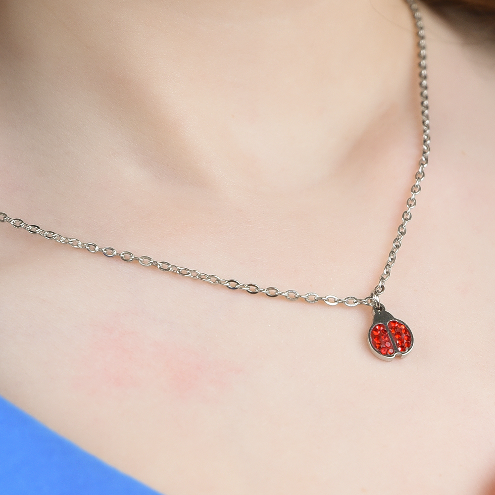 STEEL GIRL NECKLACE WITH LADYBUG AND RED CRYSTALS