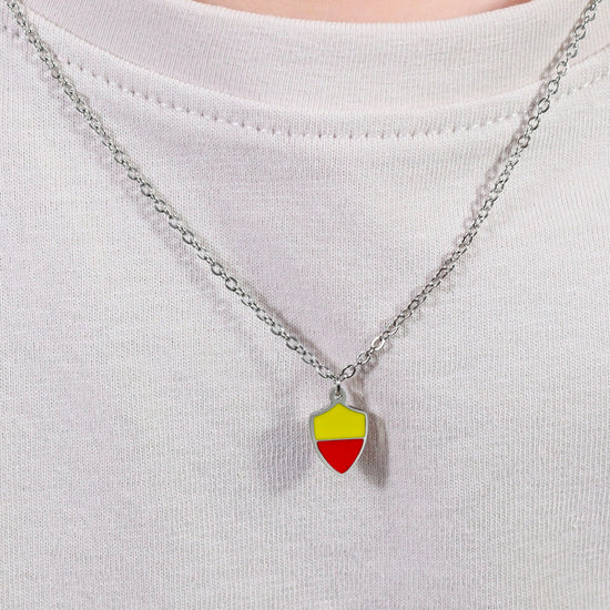 STEEL CHILD NECKLACE WITH YELLOW AND RED ENAMEL